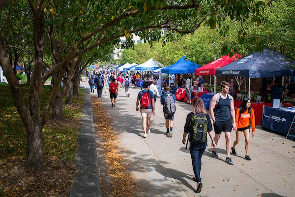 students walking across campus